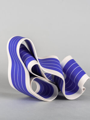 Folding in motion 2: ribbon-like ceramic sculpture by Simcha Even-Chen made with paper porcelain painted in blue with white stripes.