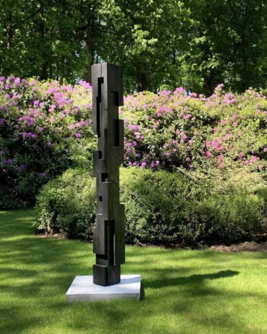Contemporary Geometric sculpture, Charred douka wood sculpture, by Alban Lanore, artwork name is Large Column III